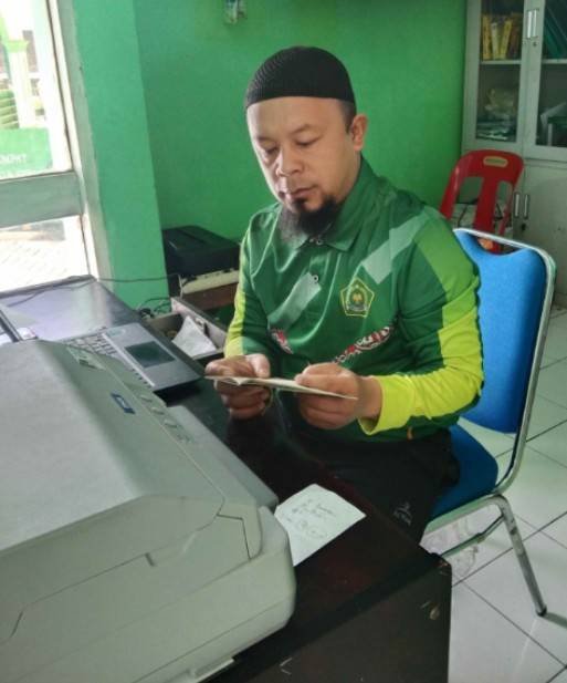 Staf KUA Sumbul Sigap Terbitkan Duplikat Buku Nikah, Permudah Masyarakat yang Kehilangan