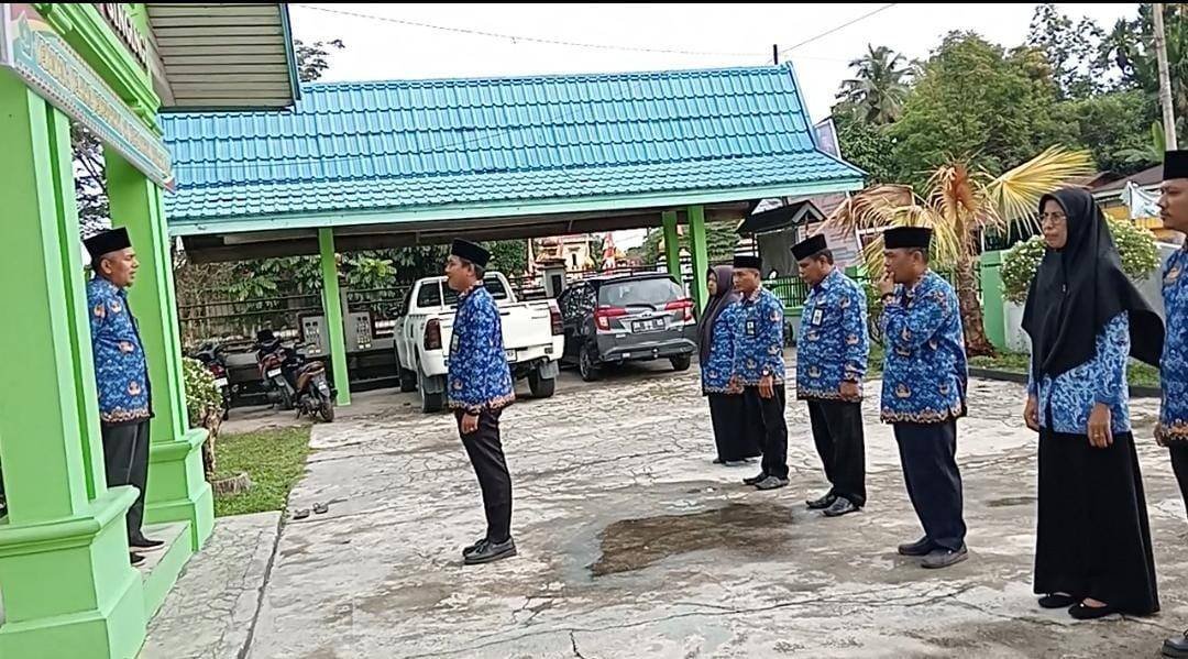 Ka. KUA Singingi Menjadi Pembina Apel Pagi