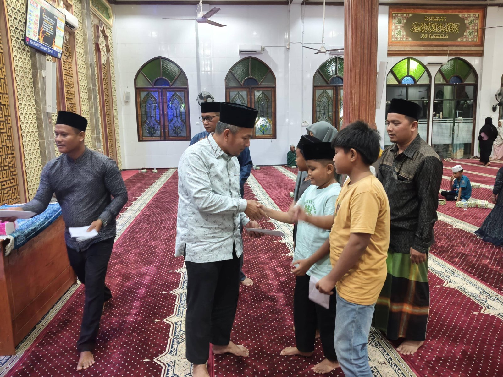 KUA Singingi Serahkan Infaq Anak Yatim Dalam Menyambut Bulan Suci Ramadhan