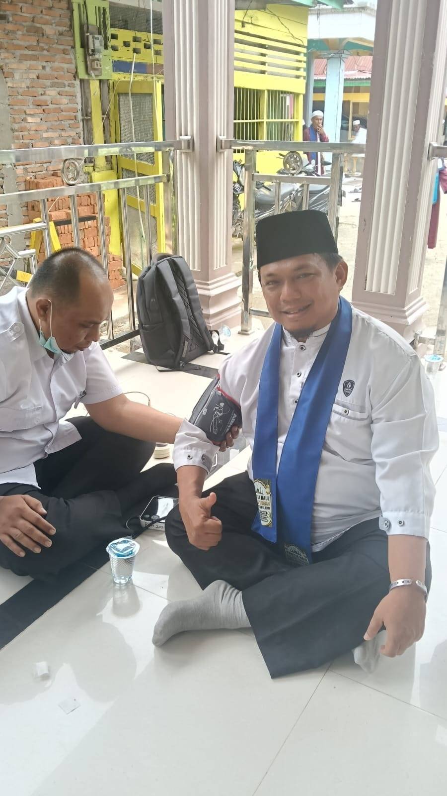 Dukungan KUA Kepada Puskesmas Sei Kepayang Gelar CKG di Tengah Rangkaian Haul ke-25 Syekh H. Mustafa BS Rokan, Ka. KUA Turut Berpartisipasi