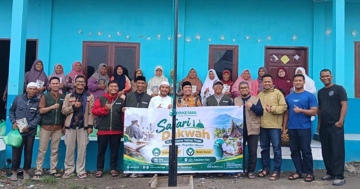 Kepala KUA Berastagi Dampingi Safari Dakwah Yakesma Tebing Tinggi di Desa Naman, Salurkan 30 Paket Sembako