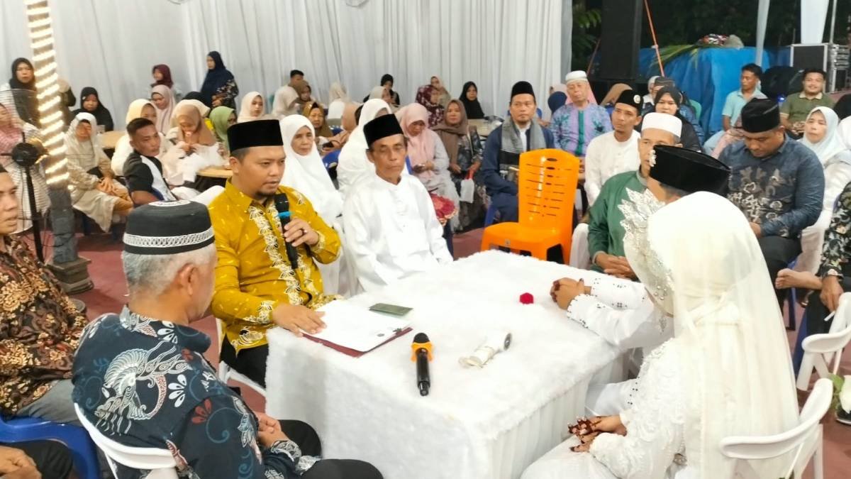 Penghulu KUA Bunut Laksanakan Pelayanan Pencatatan Nikah di Luar Balai