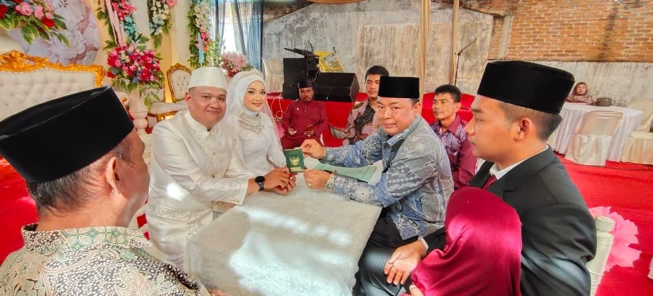 Pimpin Pelaksanaan Akad Nikah, Plt. Ka KUA Deli Tua Sampaikan Wujudkan Rumah Tangga Kekal dan Abadi
